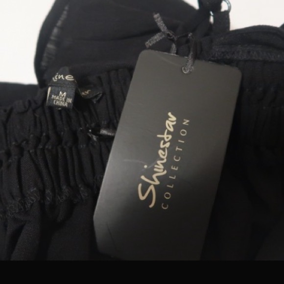 Black Ruffle Bottom Top - Picture 2 of 2